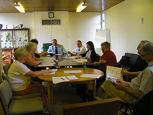 Sasha Kulidzan chairing Resident’s Monitoring meeting with his Project Team at CityWest Home during 2009.